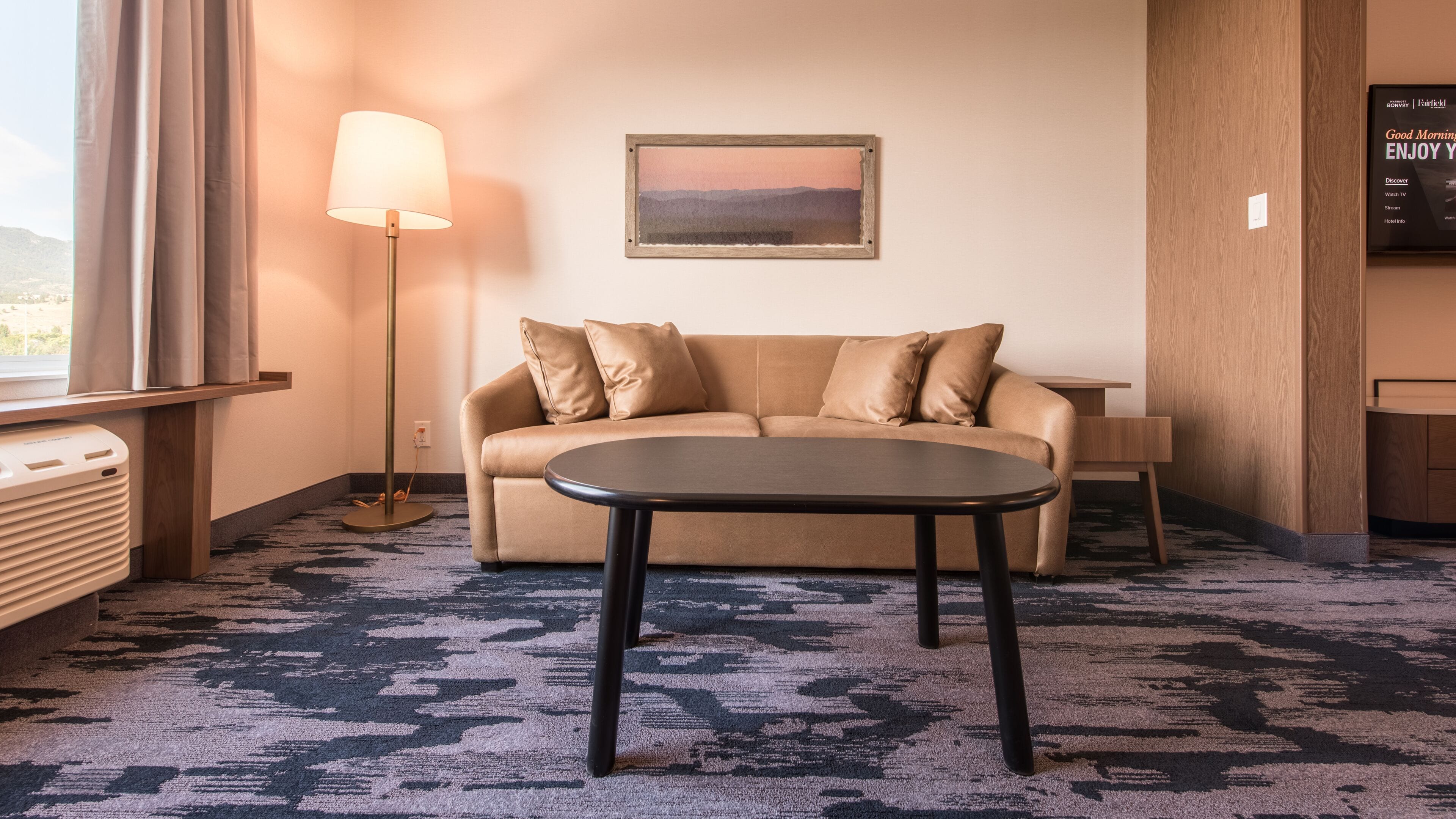 suite, 1 king bed with sofa bed | living area | flat-screen tv