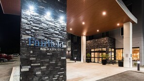 A Marriott hotel entrance with a stone facade and a modern design. - Fairfield Inn & Suites by Marriott Penticton (Penticton)