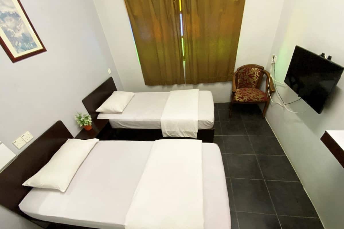 Desk, iron/ironing board (on request), bed sheets