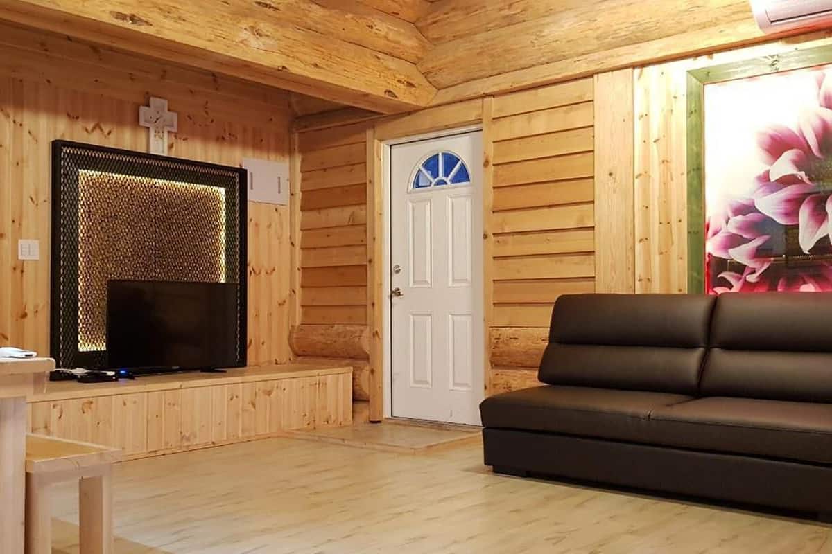4 Person Room | Living area | Flat-screen TV