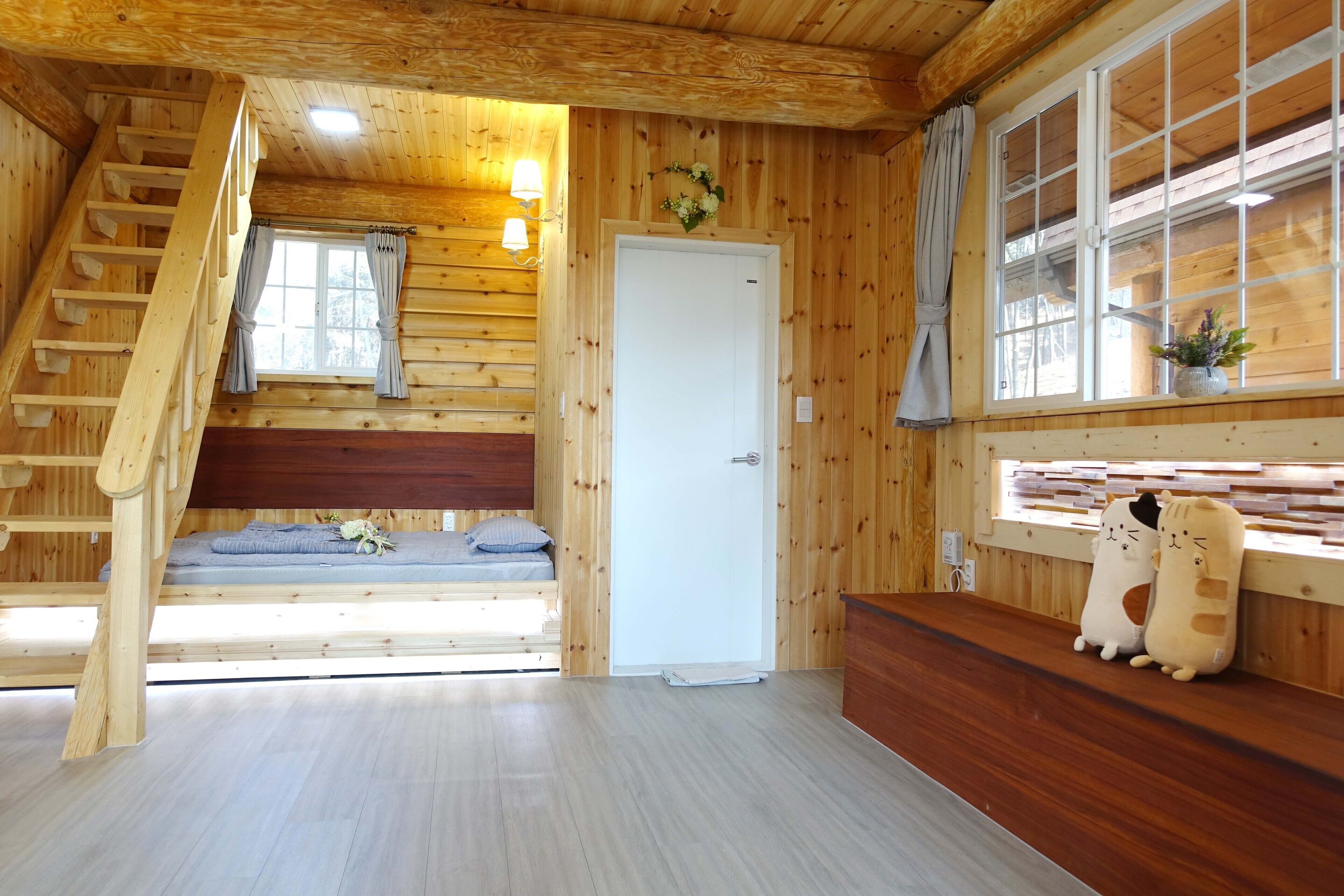 4 Person House A | Living area | Flat-screen TV