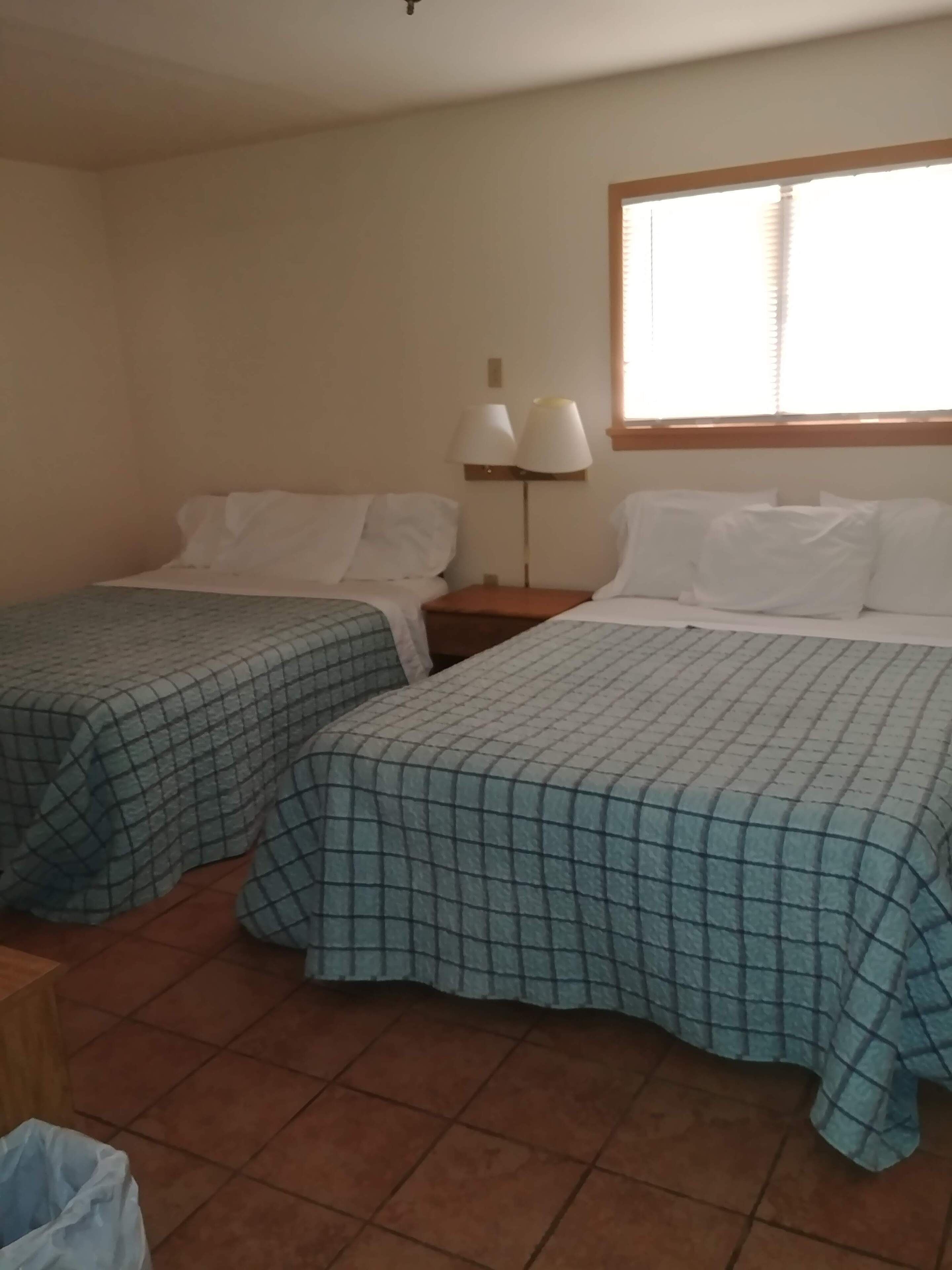 Individually decorated, laptop workspace, bed sheets