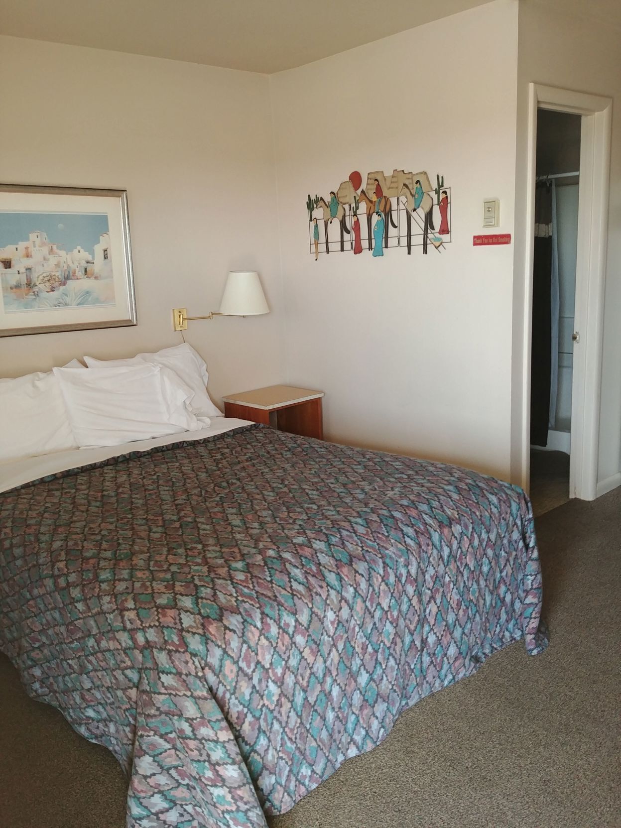 Individually decorated, laptop workspace, bed sheets