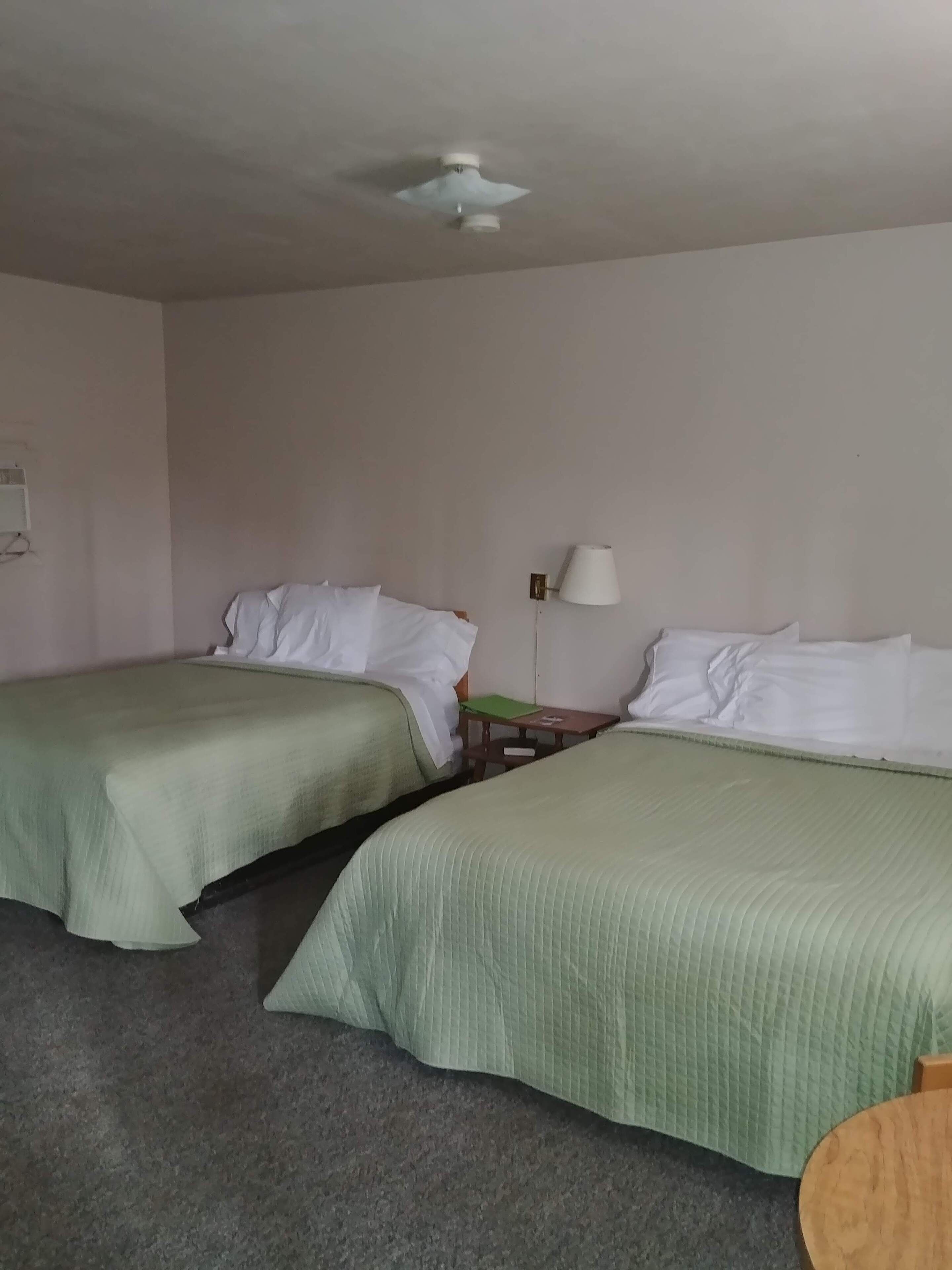 Individually decorated, laptop workspace, bed sheets