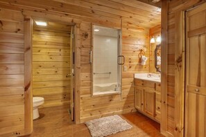 Combined shower/bathtub, jetted bath, hair dryer, towels - Newly Remodeled 4 Bedroom! Pet Friendly!! PROMOTIONAL RATES! Private Hot Tub! (Sevierville)