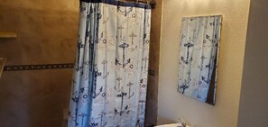 Combined shower/tub, hair dryer, towels, soap