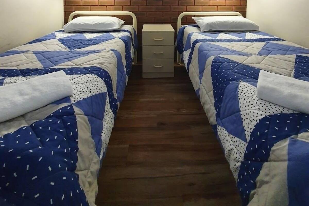 Blackout drapes, iron/ironing board, WiFi (free), bed sheets