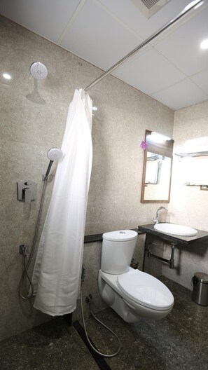 Shower, hydromassage showerhead, hair dryer, towels