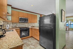 Coffee/tea maker, fridge, microwave, oven - Captivating Ocean Front Condo Living-Poipu Shores (POIPU)