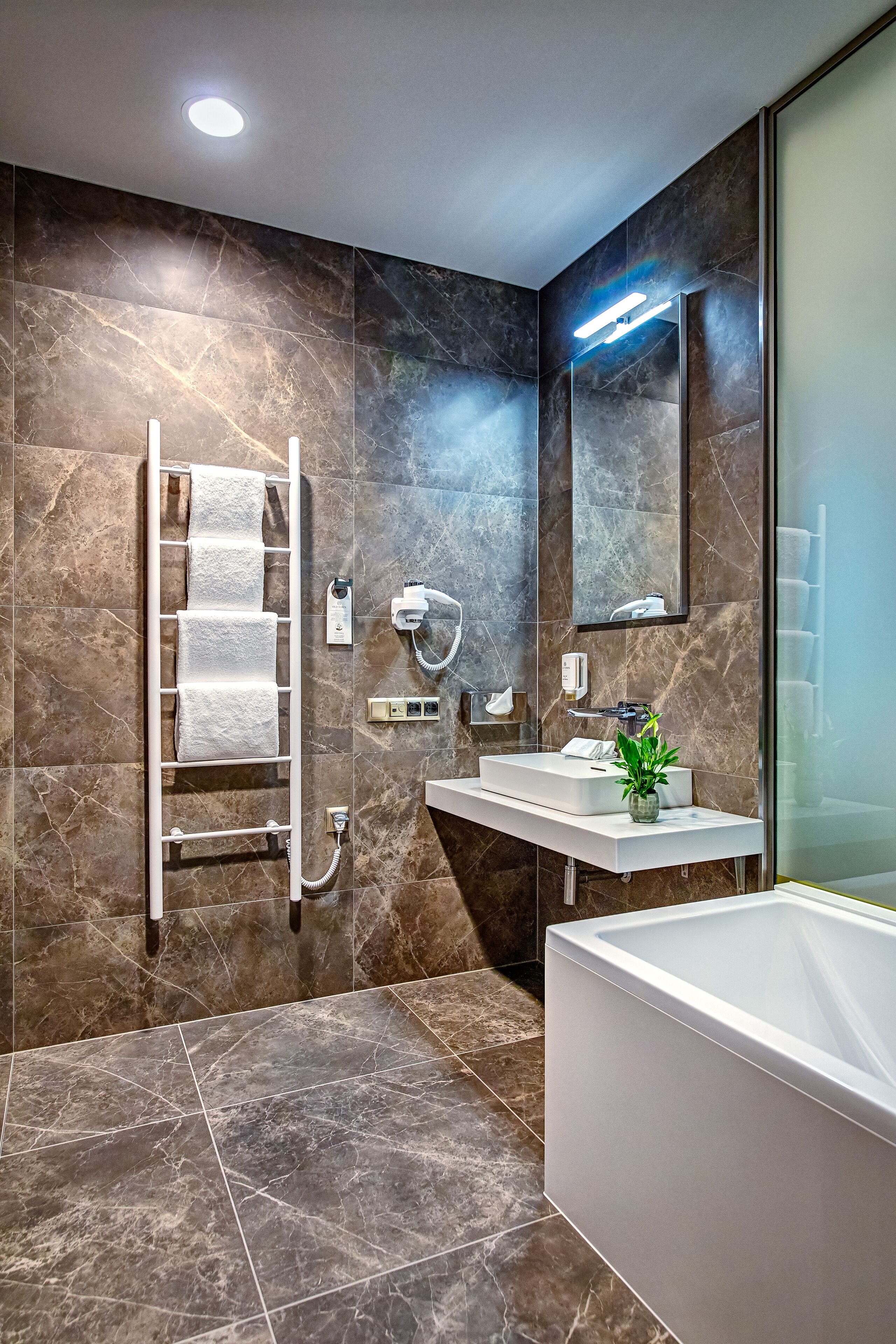 superior double room | bathroom | hair dryer, towels, soap, shampoo