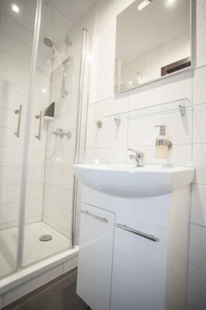 Shower, free toiletries, towels, soap