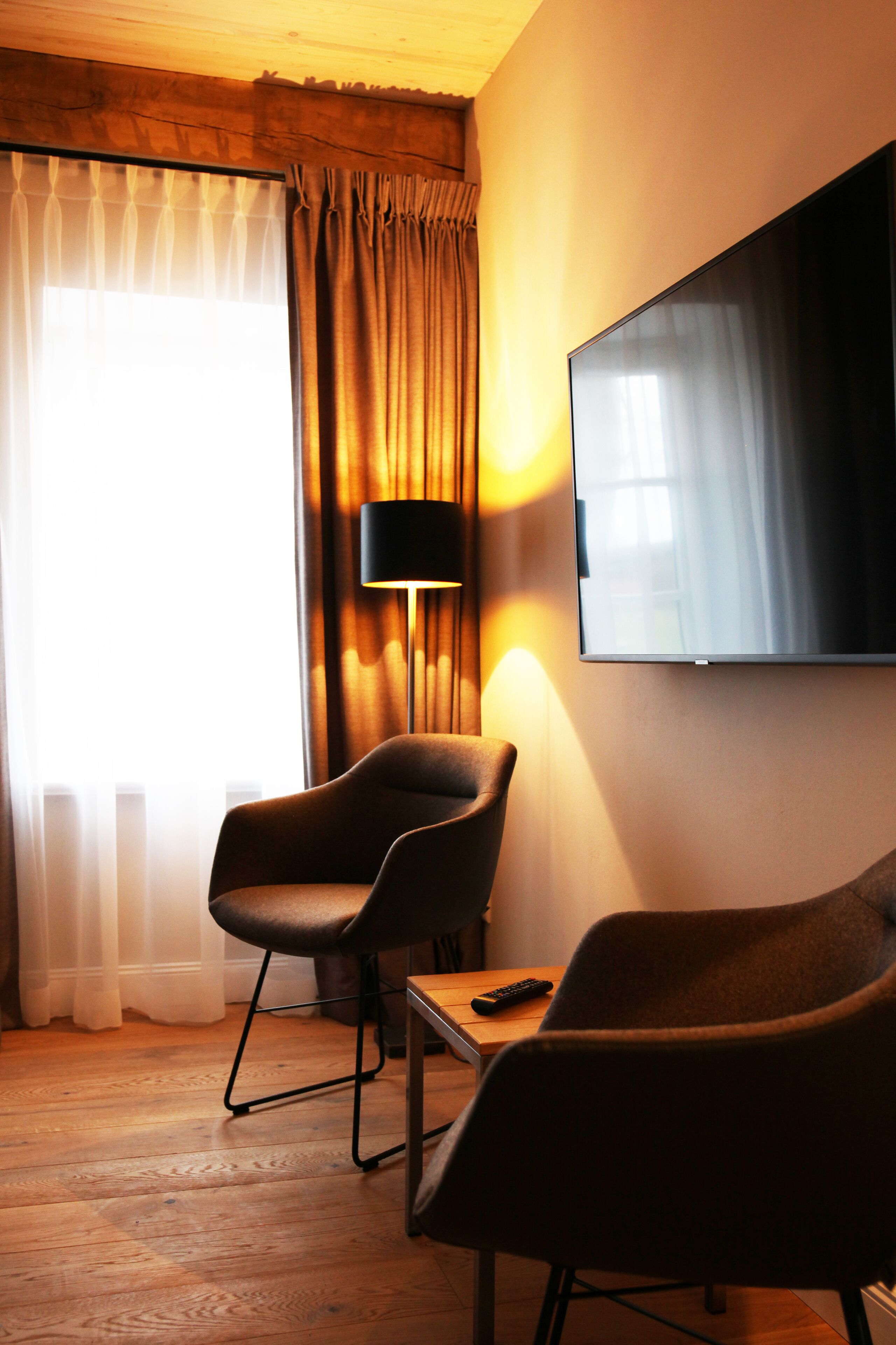 double room, garden view | living room | flat-screen tv