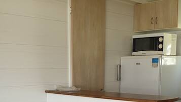 Mobile Home, 2 Bedrooms (Roseau) | Private kitchenette | Full-sized fridge, microwave, stovetop, coffee/tea maker
