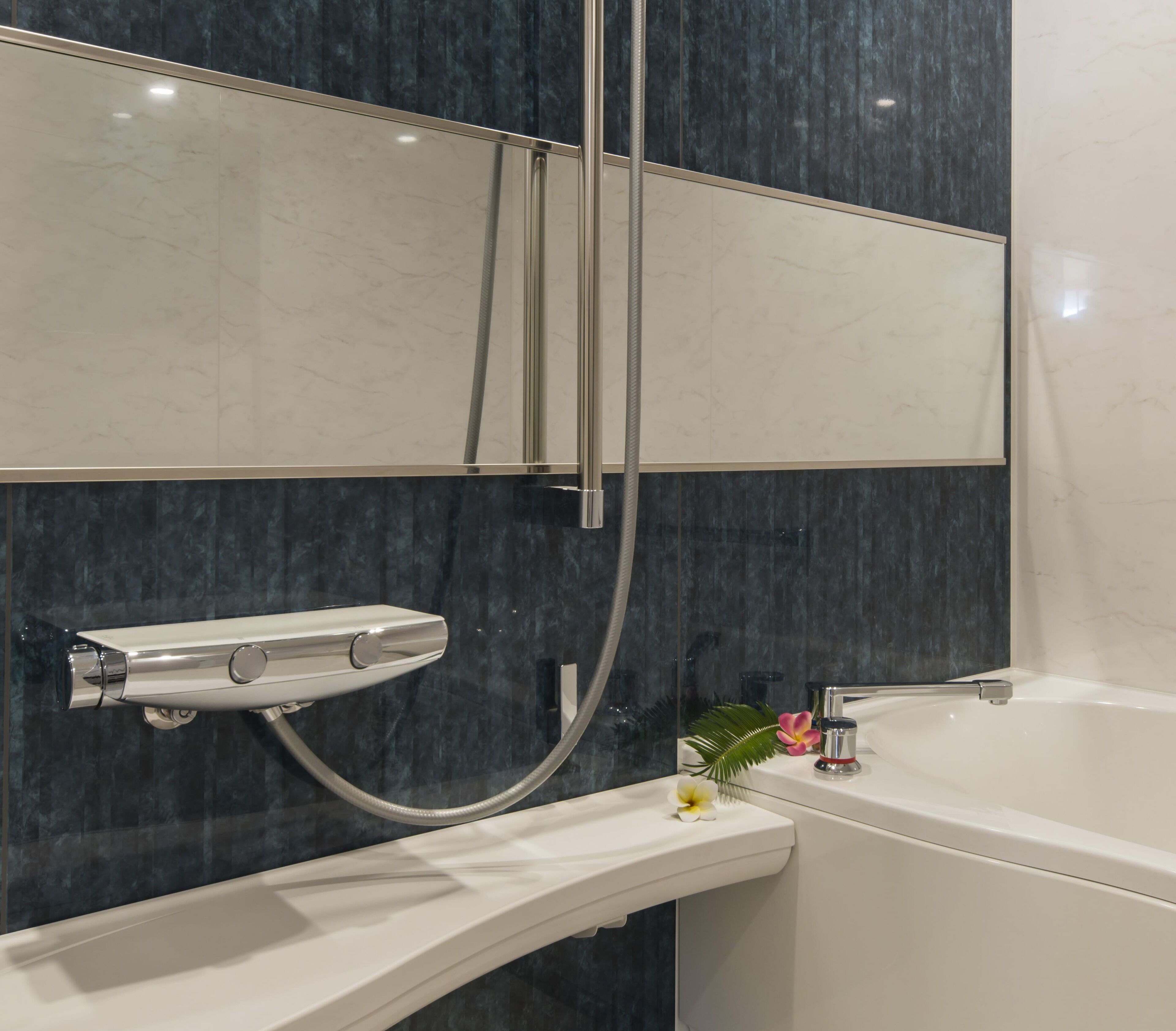 combined shower/bathtub, free toiletries, hair dryer, slippers