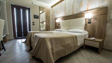 Deluxe Double or Twin Room | Minibar, in-room safe, individually furnished, desk