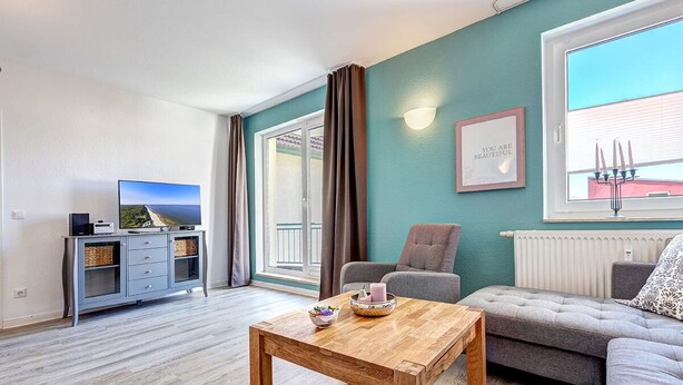 Apartment, Balcony (Ostseeglueck) | Living room | 120-cm LED TV with cable channels, TV, DVD player - Residenz Waldhaus (Zempin)
