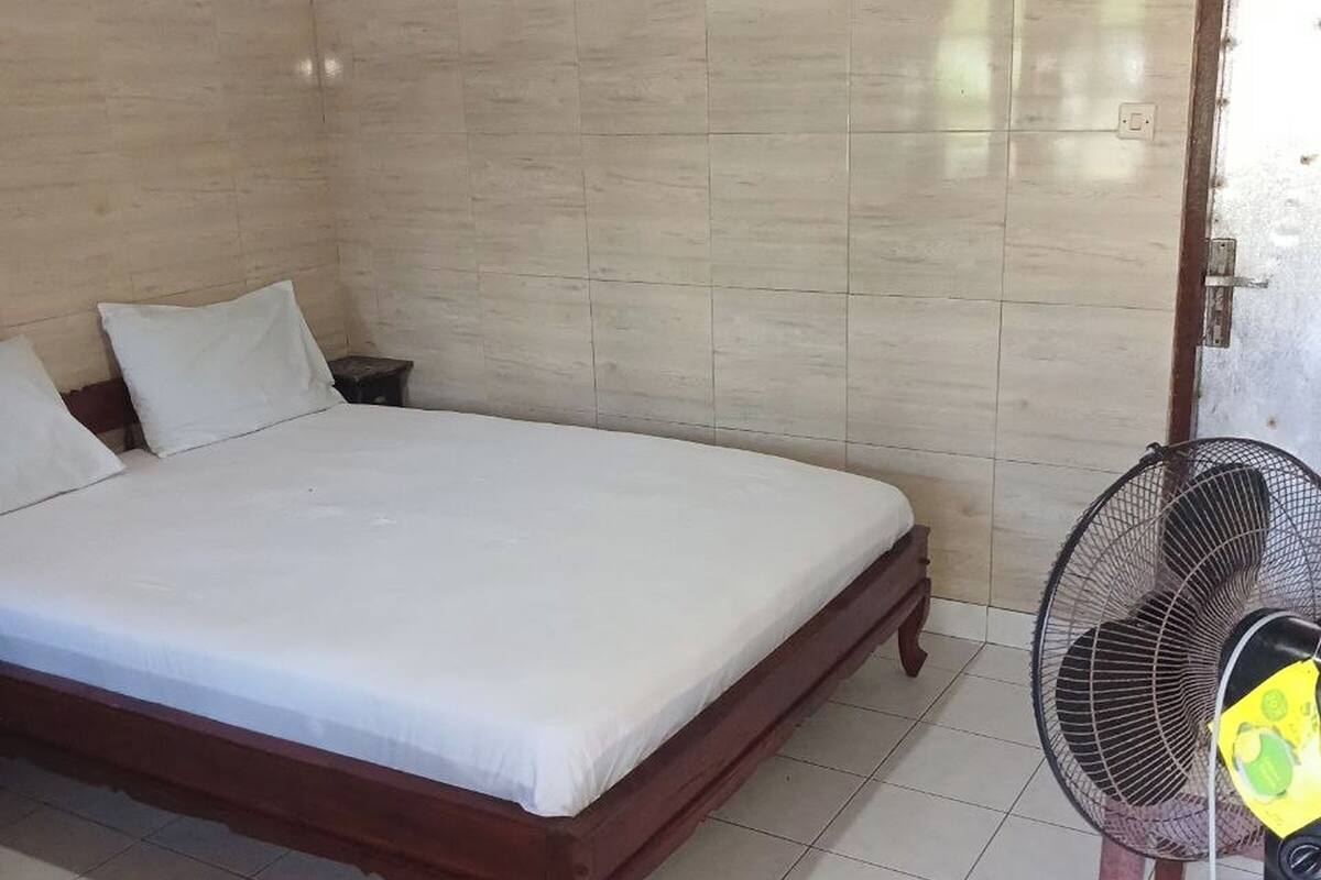 Habitación estándar (with Fan) | Escritorio, wifi gratis, ropa de cama
