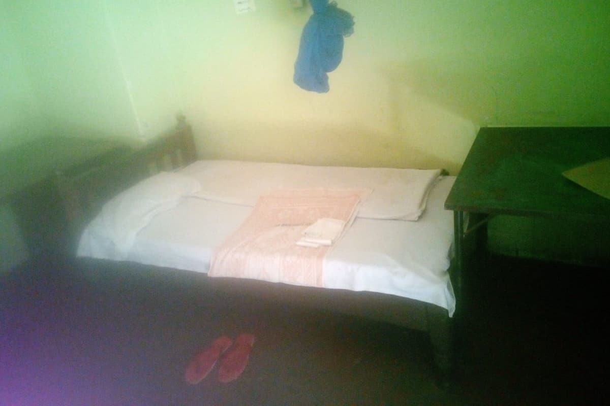 Double Room | Desk, blackout drapes, WiFi (free), bed sheets