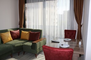 Suite Deluxe | Sala d'estar | Televisor LED 