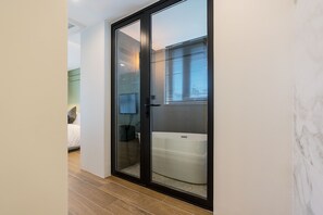 Premium Double Room | Living area | 62-inch flat-screen TV with digital channels, TV, Netflix - The May Hotel (Seoul)