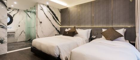 Habitación con 2 camas individuales | Edredones de plumas, cortinas opacas, sistema de insonorización