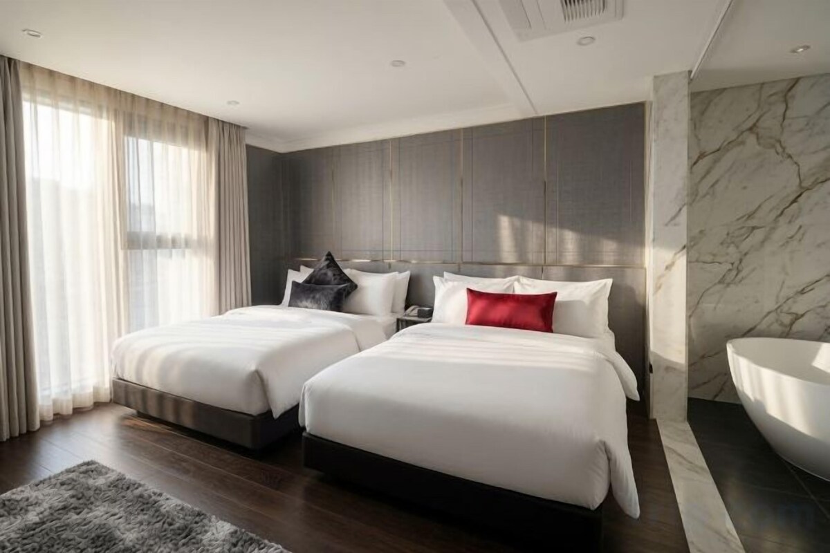 Hypo-allergenic bedding available, down comforters, blackout drapes
