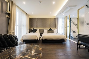 Habitación con 2 camas individuales | Edredones de plumas, cortinas opacas, sistema de insonorización