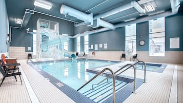 Indoor pool, open 8:00 AM to 10:00 PM, pool loungers