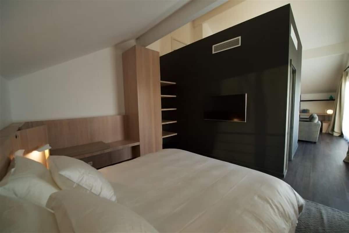 1 habitación y ropa de cama de alta calidad