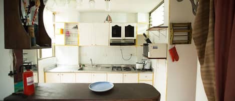 Apartment | Private kitchen | Fridge, microwave, stovetop, coffee/tea maker