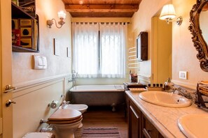 Villa, 4 Bedrooms, Patio, Garden Area | Bathroom | Hair dryer, bidet, towels, soap