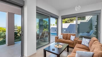 Villa, 4 Bedrooms | Living area | 40-inch flat-screen TV with satellite channels, TV, fireplace