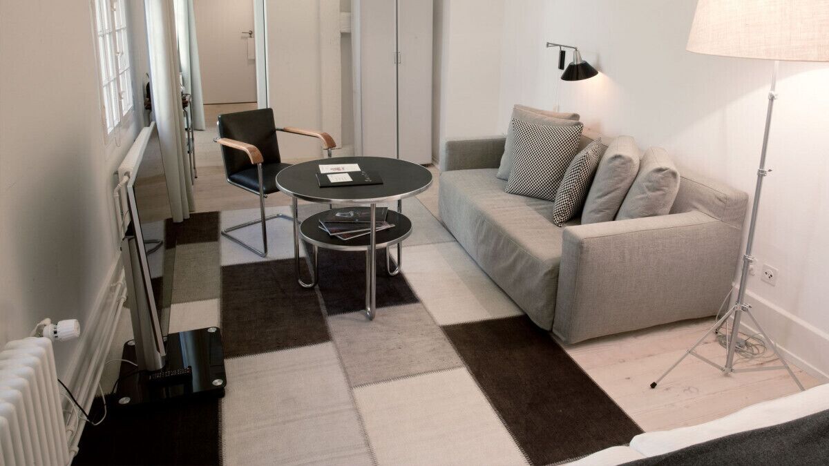 premium double room | living area | 80-cm tv with cable channels