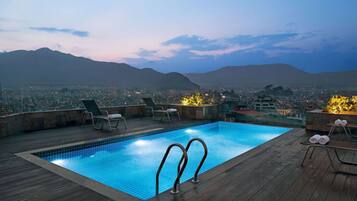 Outdoor pool, open 9:00 AM to 7:30 PM, pool umbrellas, sun loungers