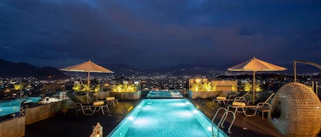 Outdoor pool, open 9:00 AM to 7:30 PM, pool umbrellas, pool loungers