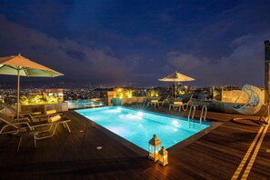 Outdoor pool, open 9:00 AM to 7:30 PM, pool umbrellas, pool loungers - Ramada Encore by Wyndham Kathmandu Thamel (Kathmandu)