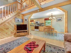 Cabin, Multiple Beds, Hot Tub | Living room | 42-inch TV with cable channels