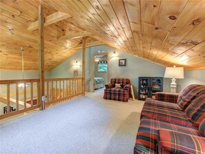 Cabin, Multiple Beds, Hot Tub | Living room | 42-inch TV with cable channels