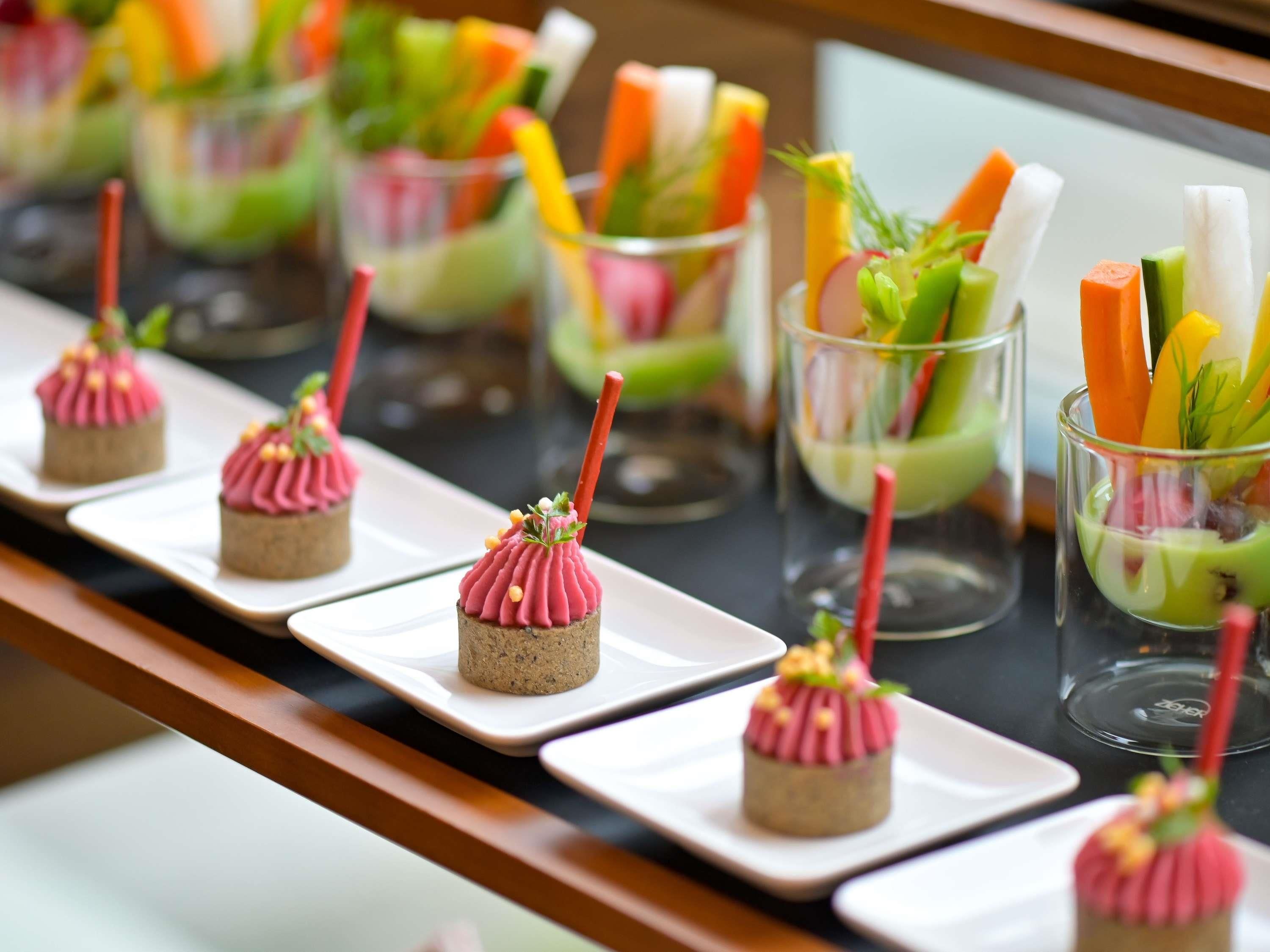 A series of appetizers arranged on a table.