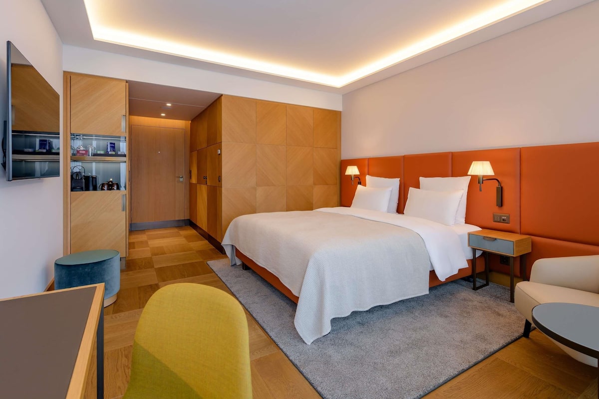 Ropa de cama de alta calidad y minibar