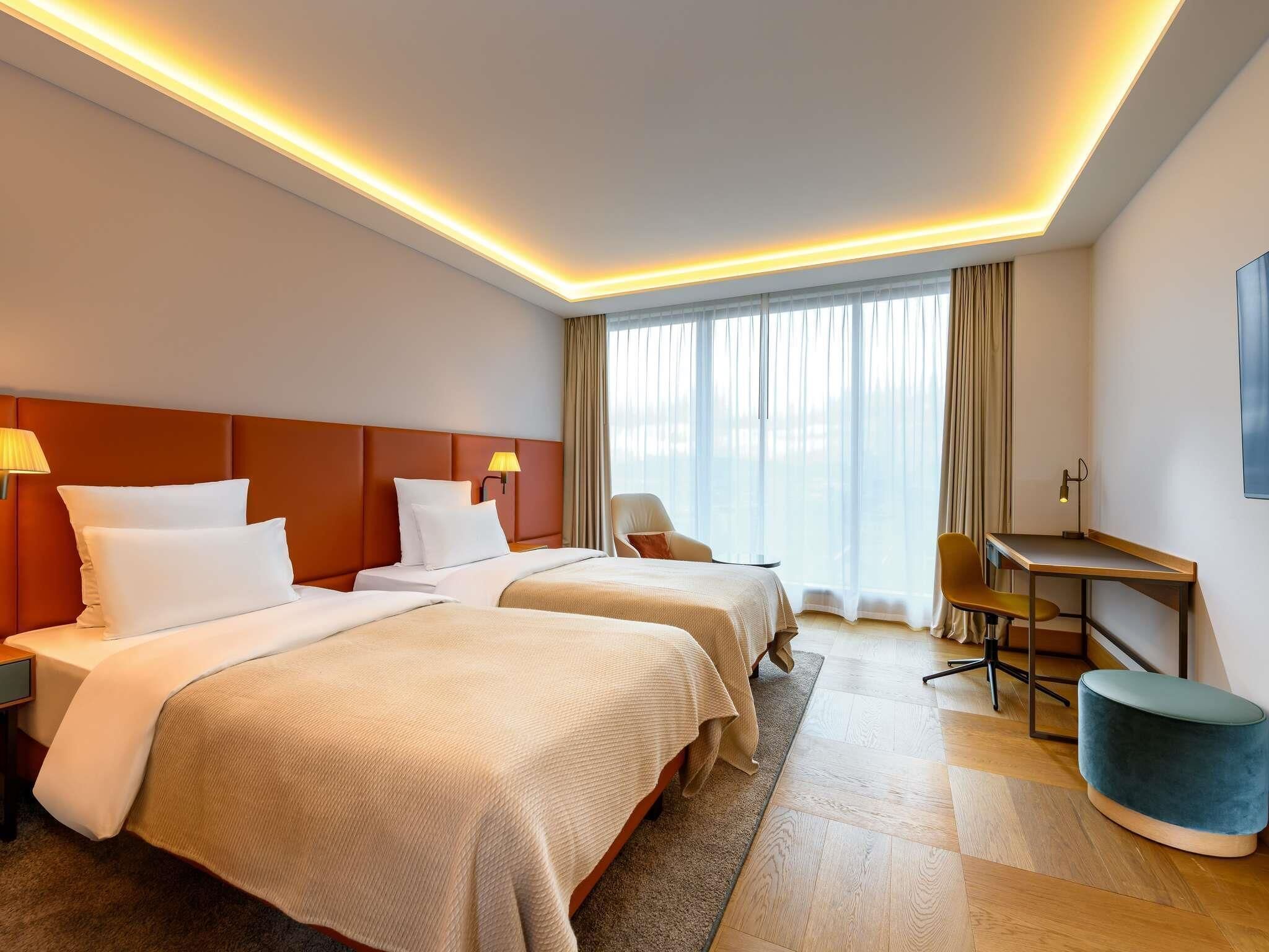 Habitación clásica, 1 cama individual | Ropa de cama de alta calidad, minibar, caja fuerte y escritorio