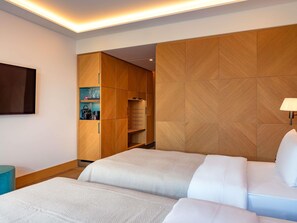Ropa de cama de alta calidad y minibar 