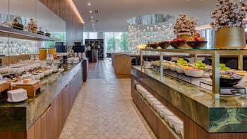 Daily buffet breakfast (CHF 38 per person)