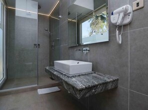 Shower, free toiletries, hair dryer, slippers