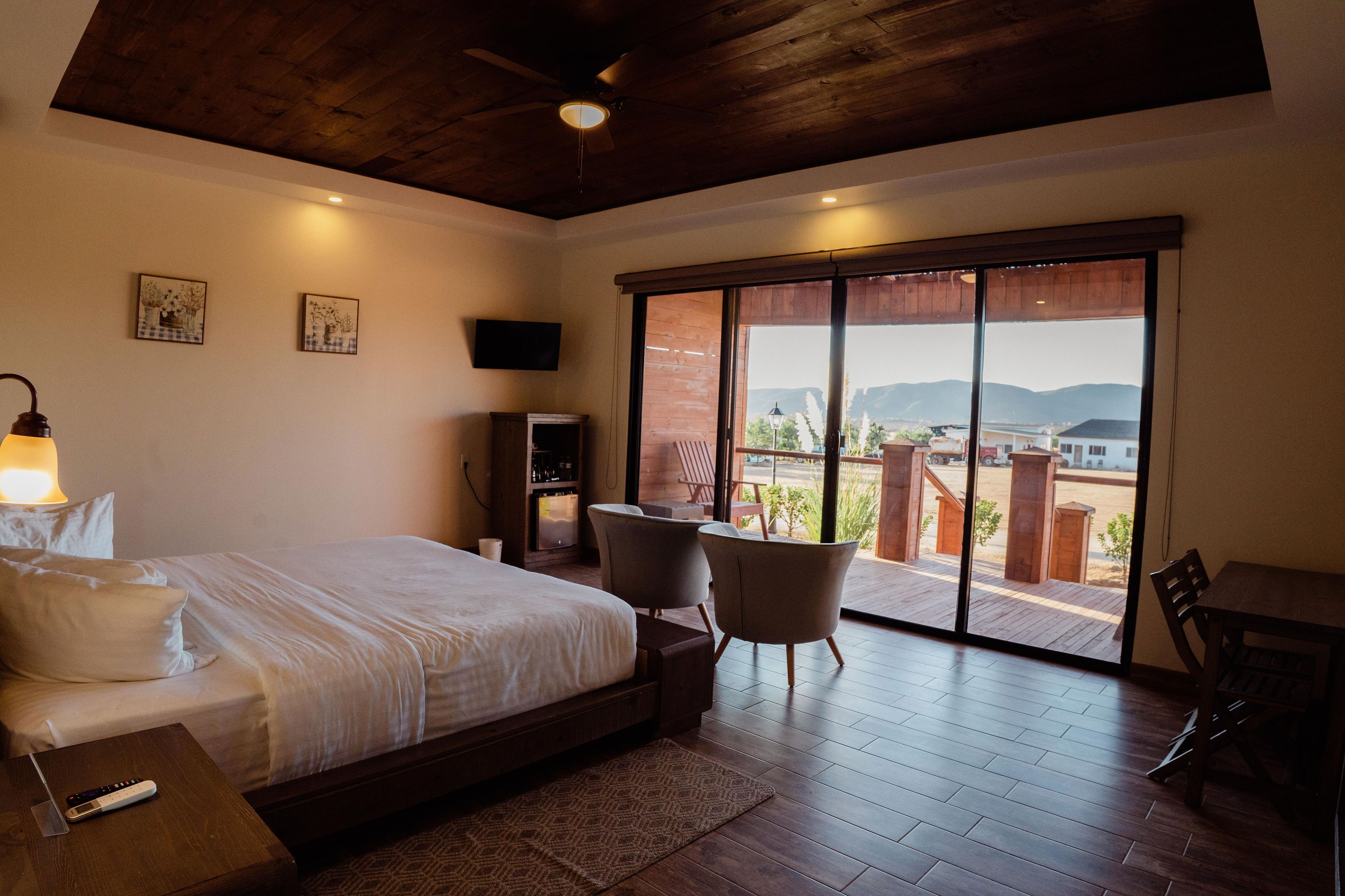 deluxe room | living area | 24-inch smart tv with digital channels, tv