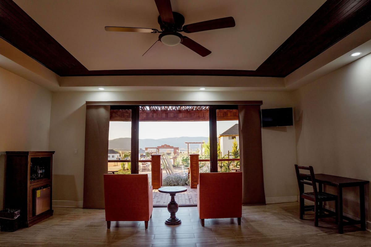 deluxe quadruple room | living area | 24-inch smart tv with digital channels, tv