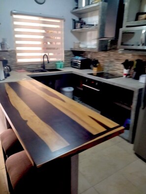 Fridge, microwave, coffee/tea maker, toaster