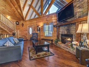 Cabin, Multiple Beds, Hot Tub, Mountain View | Living room | 42-inch TV with cable channels, fireplace, MP3 dock - Moonlight Theater Lodge, 3 Bedrooms, Hot Tub, Pool, Sleeps 14 (Pigeon Forge)