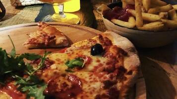 Breakfast and dinner served, pizza