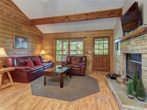 Cabin, 1 King Bed, Hot Tub | Living room | 42-inch TV with cable channels, fireplace - Sugar Plum, 1 Bedroom, Hot Tub, Wifi, Foosball, Sleeps 2 (Pigeon Forge)